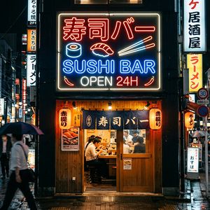 Nano Banana 2 output for the prompt: A neon storefront sign in Tokyo at night, Japanese and English mixed: "寿司バー · SUSHI BAR · OPEN 24H"