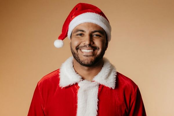 Put this man a Santa Claus costume